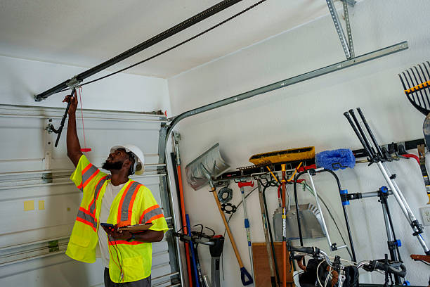 Professional Garage Door Panel Replacement technician working in Bandera County County, TX